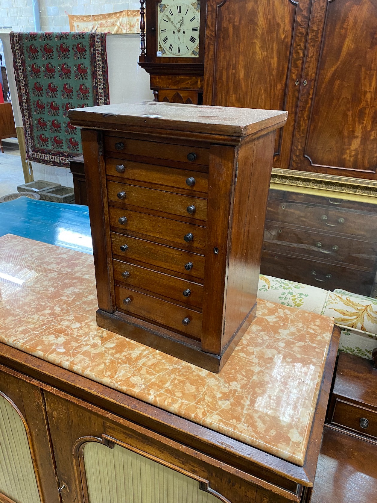 A late Victorian miniature Wellington chest, width 37cm, depth 27cm, height 53cm